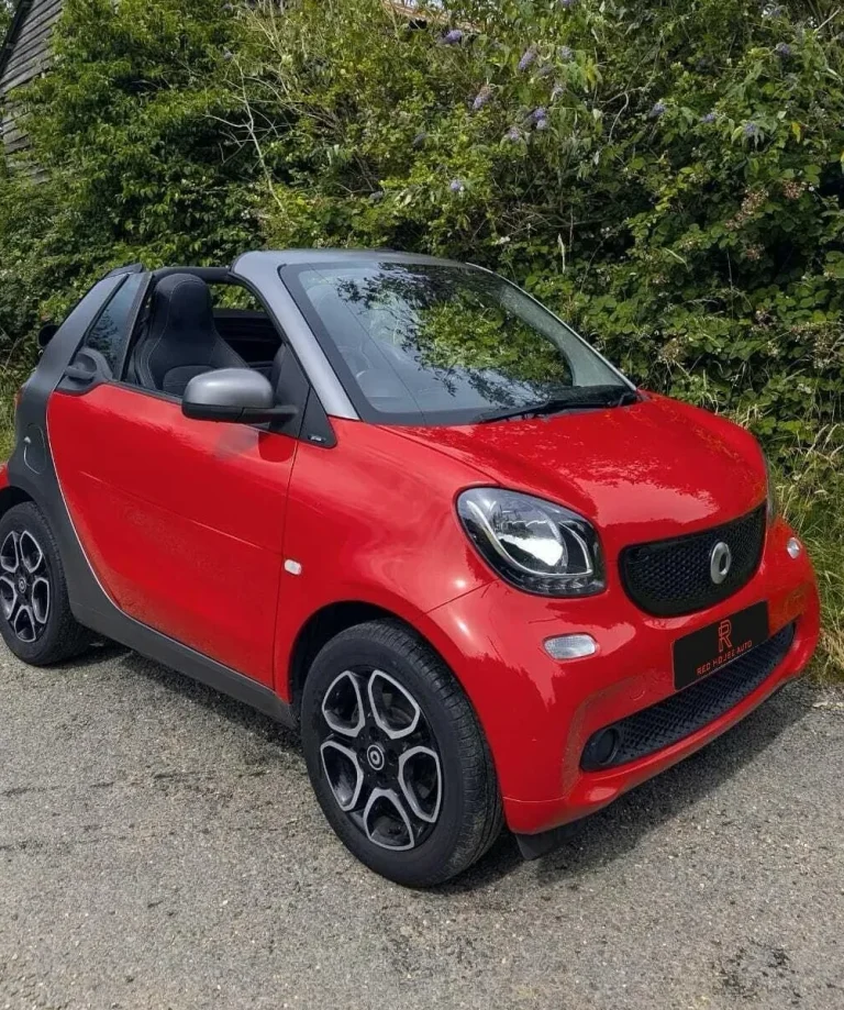 A red Smart ForTwo