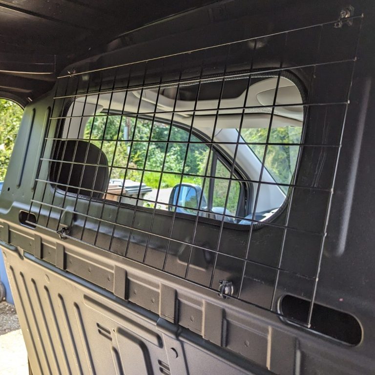 Dog van with bulkhead modification